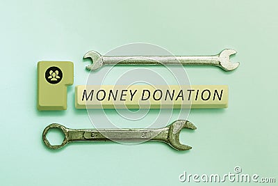 Inspiration showing sign Money Donation. Business concept a charity aid in a form of cash offered to an association Stock Photo