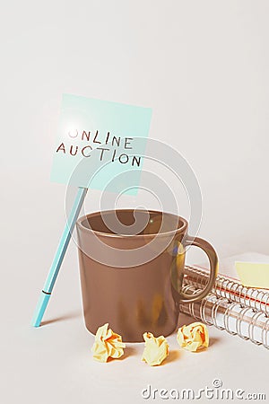 Text caption presenting Online Auction. Word Written on digitized sale event which item is sold to the highest bidder Stock Photo
