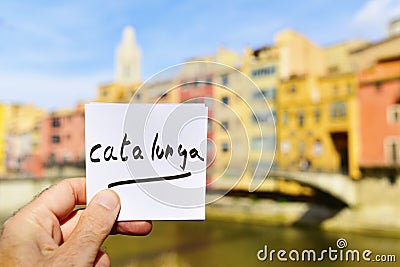 Text Catalunya in a note in Girona, Spain Stock Photo