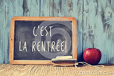 Text cest la rentree, back to school in french, written on a cha Stock Photo