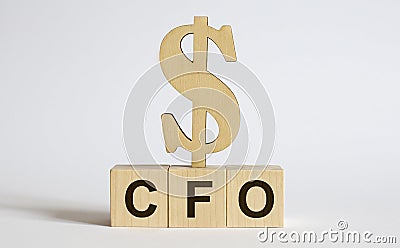 Text CFO on the wood cube block, stock investment concept Stock Photo