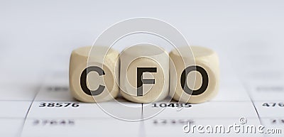 Text CFO on a wooden cube blocks Stock Photo