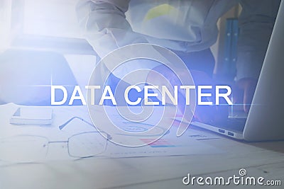 Text Data Center background men are working on a computer. The concept of working with a lot of information. Stock Photo