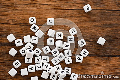 Text dice cube concept - Letter dices alphabet on wooden background Stock Photo