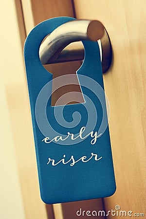 Text early riser in a door hanger Stock Photo