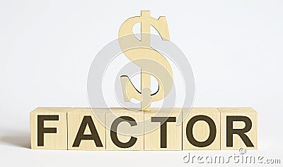 Text FACTOR on wood cube block, stock investment concept Stock Photo