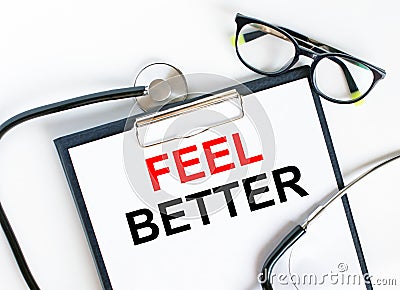 Text Feel Better in the folder with the stethoscope and glasses Stock Photo