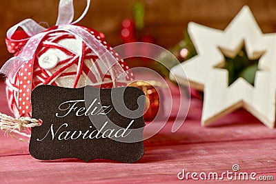 Text feliz navidad, merry christmas in spanish Stock Photo