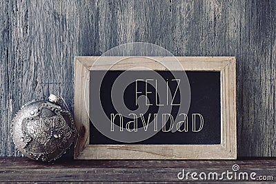 Text feliz navidad, merry christmas in spanish Stock Photo