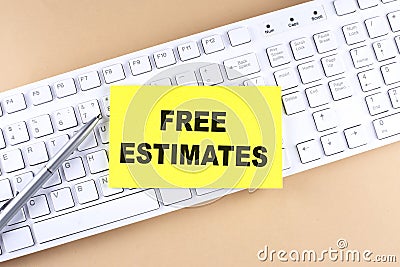 Text FREE ESTIMATES text on a sticky on keyboard, business concept Stock Photo