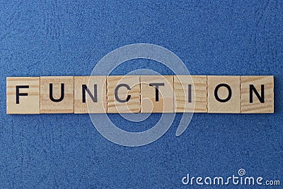 text on gray word function in small wooden letters Stock Photo
