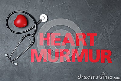 Text Heart Murmur with stethoscope on grey background Stock Photo