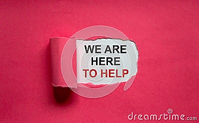 The text `we are here to help` appearing behind torn pink paper. Business concept. Copy space Stock Photo