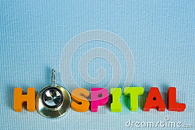 Text hospital alphabet with stethoscope, healthy and health care concept Stock Photo