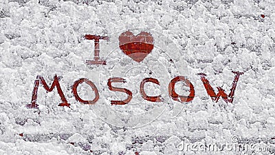 Text: I love Moscow. On snow-covered brick wall Stock Photo
