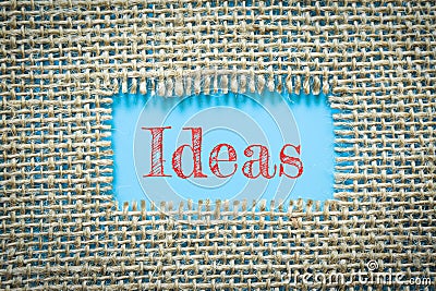 Text Ideas on paper blue has Cotton yarn background you can apply to your product. Stock Photo