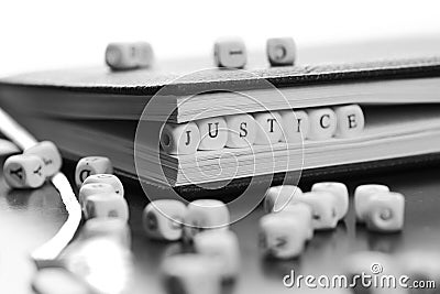 Text justic on cube Stock Photo