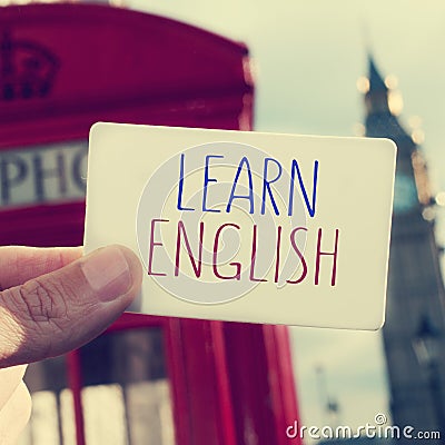 text learn english in a signboard with the Big Ben in the background, with a filter effect Stock Photo