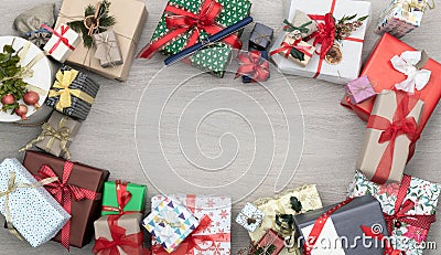 Text or logo empty copy space in vertical top view wooden table full of christmas or birthday gifts presents.Xmas winter Stock Photo