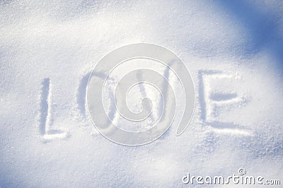 Text LOVE on the snow Stock Photo