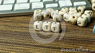 Text LTF on wooden cube image for business content Stock Photo