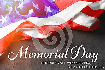 Text MEMORIAL DAY and USA flag on gray background. Stock Photo