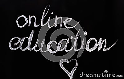 Text 'Online education' on glass using brush and paint Stock Photo