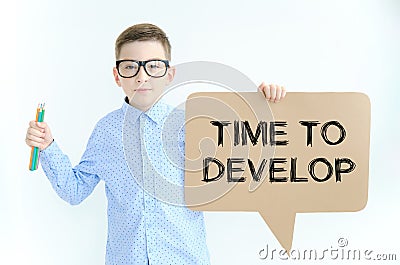 text on paper time to develop in hand boy. Personal growth concept Stock Photo