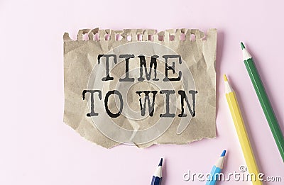 Paper Time to win on pink background. Business Concept Stock Photo