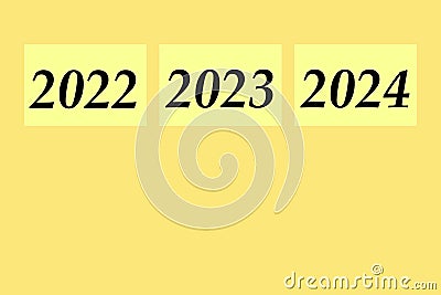 Text 2024 . 2023. Postcard Happy New Year 2024. From 2023 to 2024. Merry Christmas and Happy New Year. Yellow background Stock Photo