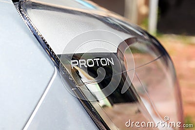 The Text `Proton` Etched On The Headlamp Cover Editorial Stock Photo