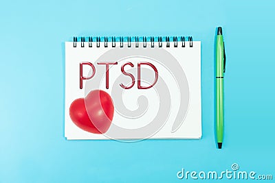 Text PTSD of Posttraumatic stress disorder on paper with rubber Stock Photo