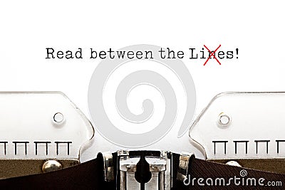 Read Between The Lies Concept On Typewriter Stock Photo