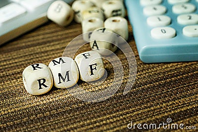 Text RMF on wooden cube for business content Stock Photo