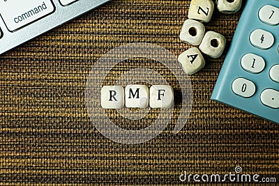 Text RMF on wooden cube for business content Stock Photo