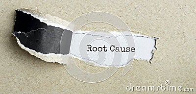 The text Root Cause appearing behind torn brown paper Stock Photo