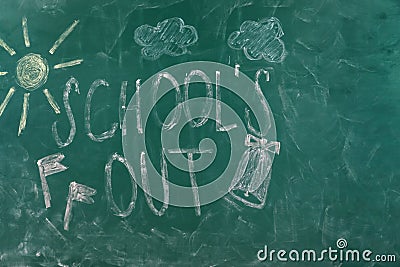 Text School`s Out and drawings on chalkboard. Summer holidays Stock Photo