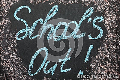 Text School`s Out written on chalkboard. Summer holidays Stock Photo