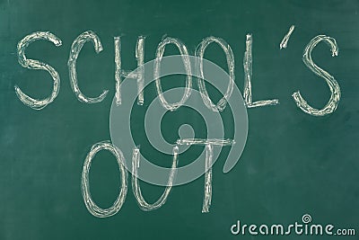 Text School`s Out written on chalkboard. Summer holidays Stock Photo