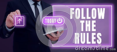 Text showing inspiration Follow The Rules. Conceptual photo learn to conform the compliance, regulations, or guidelines Stock Photo
