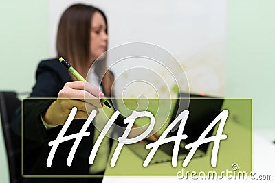 Hand writing sign Hipaa. Business idea Acronym stands for Health Insurance Portability Accountability Stock Photo