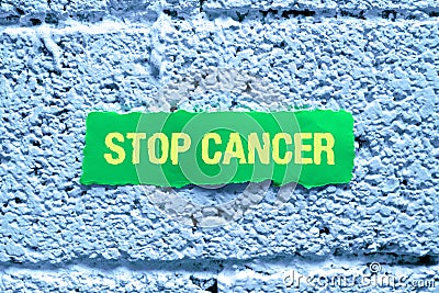 Hand writing sign Stop Cancer. Business overview quit the use of banned athletic performanceenhancing drugs Stock Photo