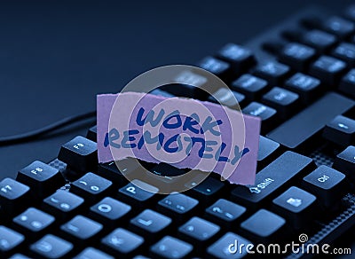 Text showing inspiration Work Remotely. Business showcase fresh working style where employees handles job away from the Stock Photo