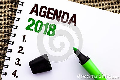 Text sign showing Agenda 2018. Conceptual photo Strategy Planning Things Schedule Future Goals Organize written on Notebook Book o Stock Photo