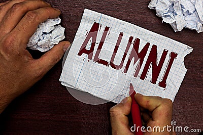 Text sign showing Alumni. Conceptual photo former pupil or student especially male one of particular school Man holding Stock Photo