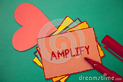 Text sign showing Amplify. Conceptual photo Make something bigger louder increase the volume using amplifier Stock Photo