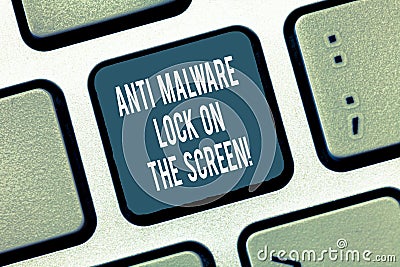 Text sign showing Anti Malware Lock On The Screen. Conceptual photo Security safety against malware hacking Keyboard key Stock Photo