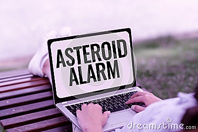 Writing displaying text Asteroid Alarm. Concept meaning warning to prepare the cities in a space rock s is flight path Stock Photo