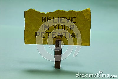 Text sign showing Believe In Your Potential. Conceptual photo Have self-confidence motiavate inspire yourself Paperclip hold torn Stock Photo