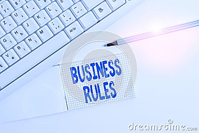 Text sign showing Business Rules. Conceptual photo a specific directive that constrains or defines a business White pc keyboard Stock Photo